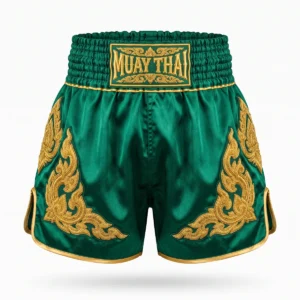 Emerald green Muay Thai shorts with gold embroidery