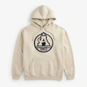 Oatmeal hoodie with navy club badge