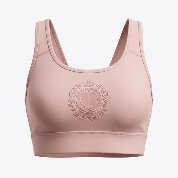 Custom Sports Bra – Blush Embossed Crest Blush pink sports bra with embossed crest