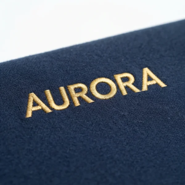 Navy t-shirt with gold embroidered lettering detail