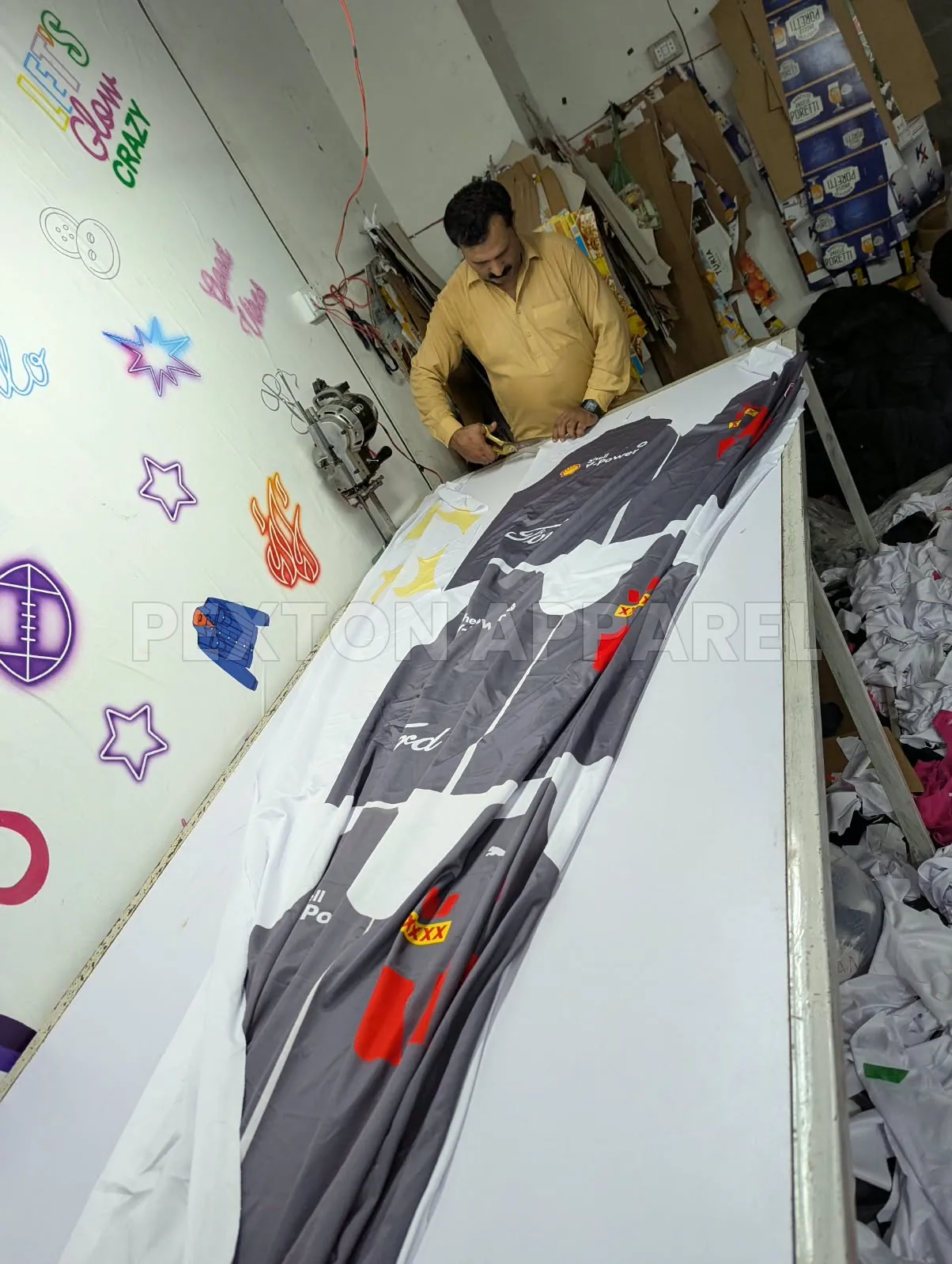 Cutting sublimated jersey panels at Pexton Apparel