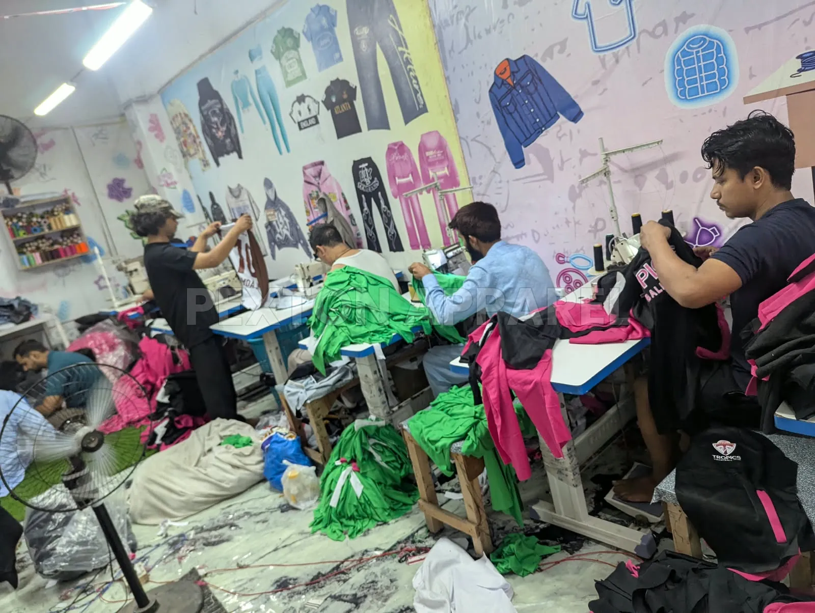 Stitching team sewing garments on the Pexton Apparel production line