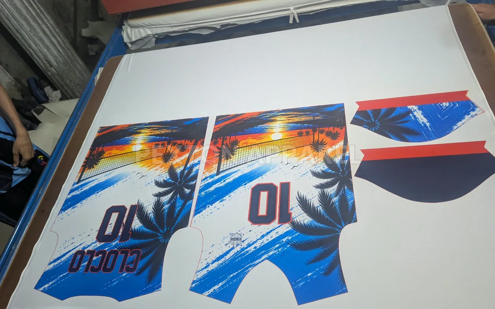 Heat transferring sublimated jersey panels at Pexton Apparel
