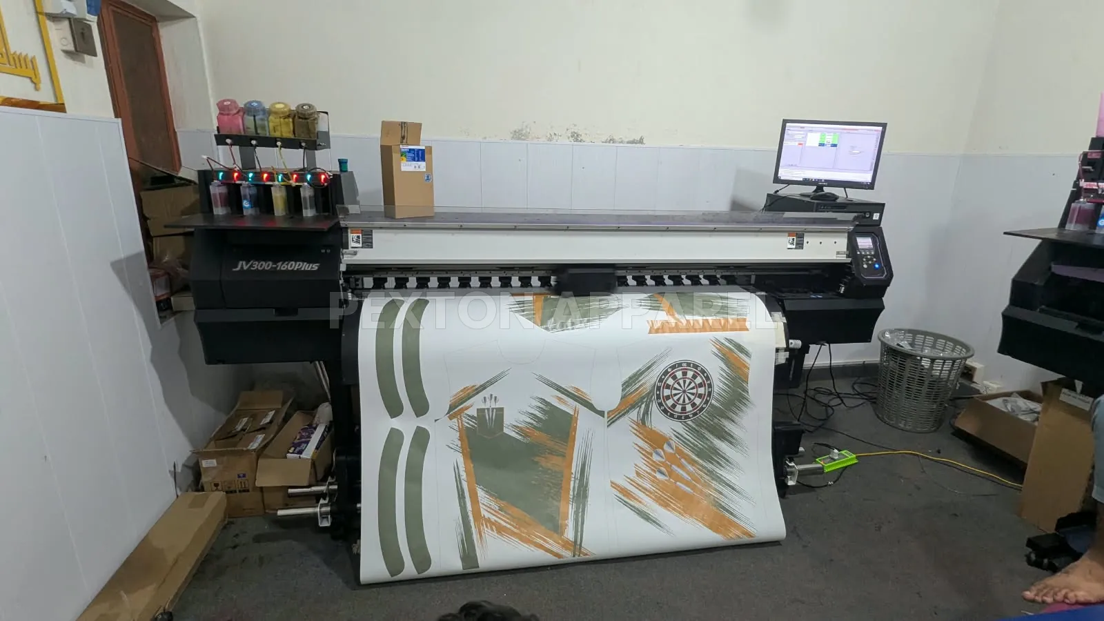 Sublimation printer printing a dart jersey design at Pexton Apparel